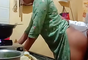 Hot neighbour aunty gets fucked overwrought the young boy in kitchen
