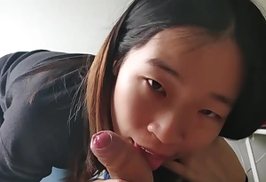 Cute asian babe sucks her BF's white cock increased by takes a facial POV