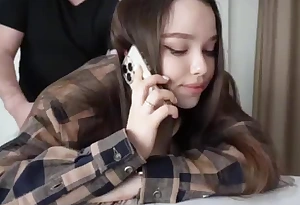Fucking my stepsister while she's on the phone.